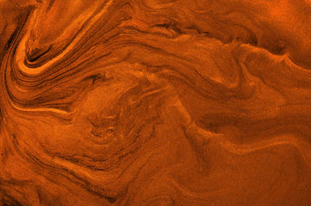 Gold marbling texture design. Red and golden marble pattern. Fluid art.の写真素材