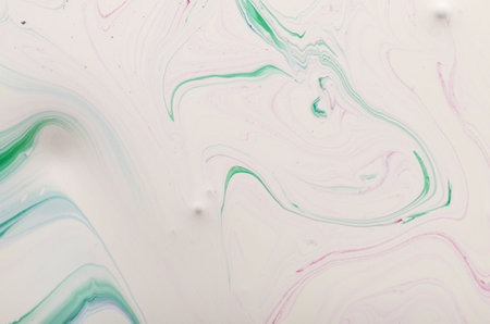 Abstract background of acrylic paint in white and green tones. Marbling texture.の写真素材