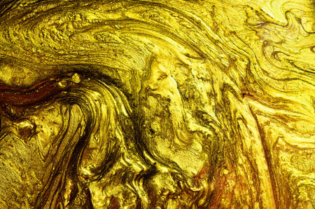 Blurred gold golden metal glitter surface background textureの写真素材