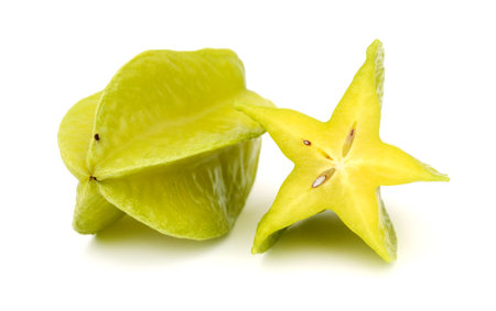 Whole carambola fruit and a cut oneの写真素材