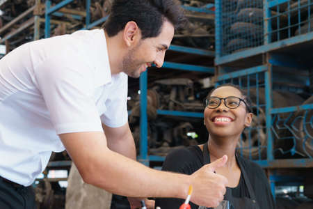 Man admire woman for great job. Diversity of two people, caucasian business manager work with...