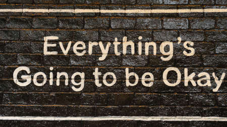 printing of good word on brown brick wall for inspiration backgroundの写真素材
