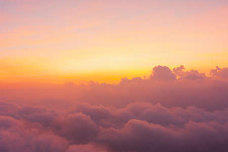 beautiful sunlight of sun while sunrise or sunset with soft cloud above peak mountain, landscape view of peak mountain at national park in asia-thailandの写真素材