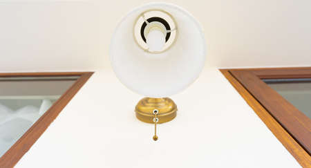angle view of vintage antique lamp at walkway in daytime on outdoor street or pathの写真素材