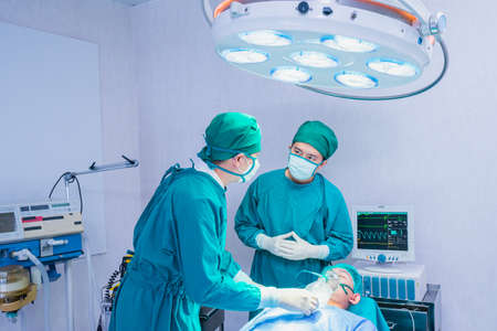 doctors prepare for surgery in operating room, operation or surgery room in hospital for doctor and patientの写真素材