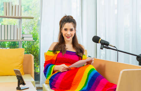 young lgbt women relaxing before singing in living room at home, lifestyle of couple lgbt loving women happy in romance love and funの写真素材
