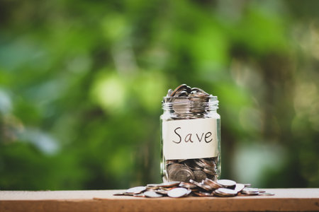 save money for investment concept money in the glass with filter effect retro vintage styleの写真素材