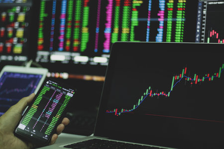 Stock market graphs analysis. Stock market data on monitor. Stock market financial graph on monitor. Stock market financial data on monitor. Business financial graph on monitor.の写真素材