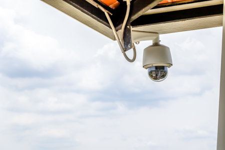 CCTV on building for security with sky background