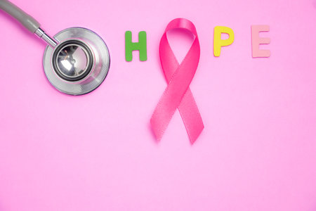 breast cancer awareness ribbon on pink backgroundの写真素材
