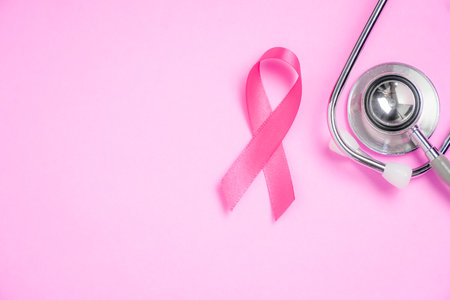 breast cancer awareness ribbon on pink backgroundの写真素材