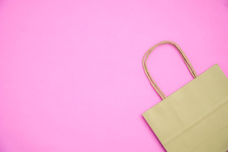 Paper bag on pink backgroundの写真素材