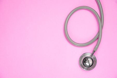 breast cancer awareness ribbon on pink backgroundの写真素材