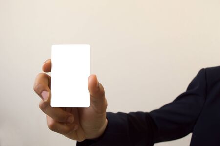 business man holding cardの写真素材