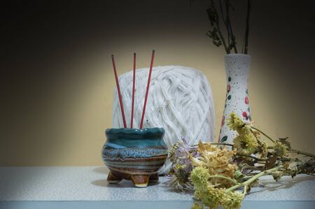 still life chrysanthemum and incenseの写真素材