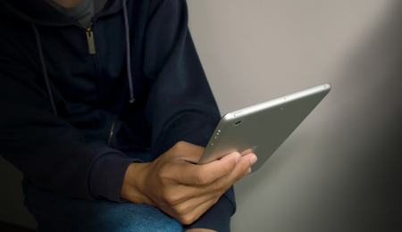 close up tablet on hands man