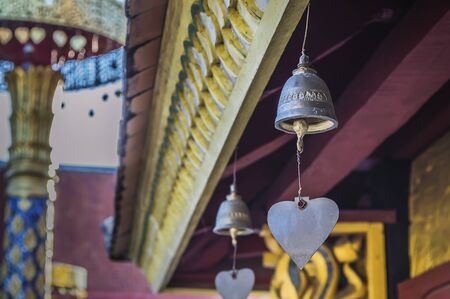 Row of bells in buddhist temple, asiaの写真素材