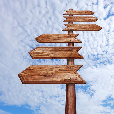 wooden blank sign against the skyの写真素材