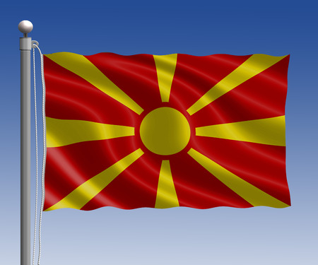 Macedonia flag in pole on blue sky backgroundの写真素材