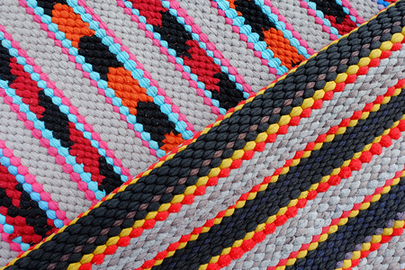 carpet background or texture with stripes in many colors