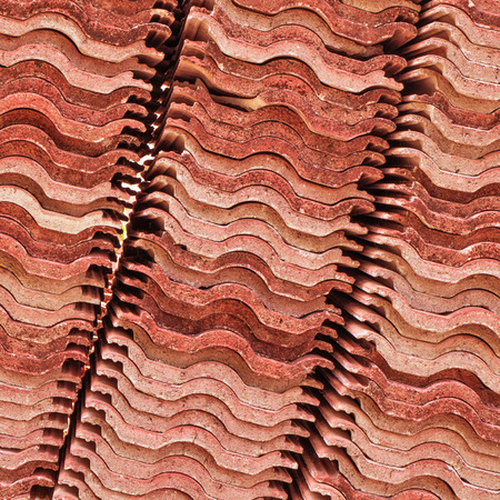 stack of red roof tilesの写真素材