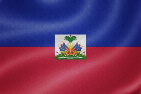Haiti flag on the fabric texture backgroundの写真素材
