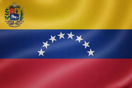 Venezuela flag on the fabric texture backgroundの写真素材