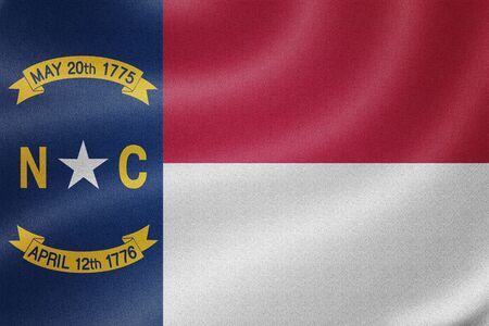 North Carolina flag on the fabric texture background