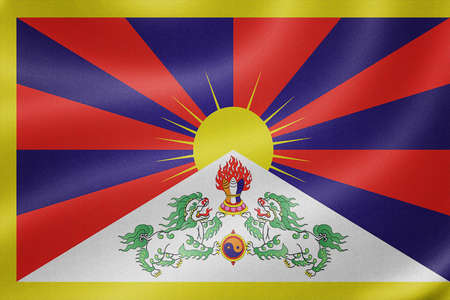 Tibet flag on the fabric texture backgroundの写真素材