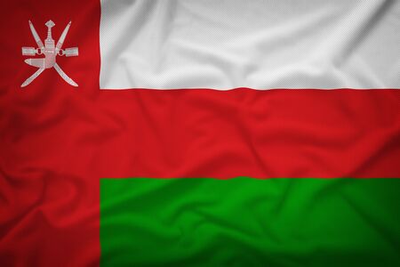 Oman flag on the fabric texture background,Vintage styleの写真素材