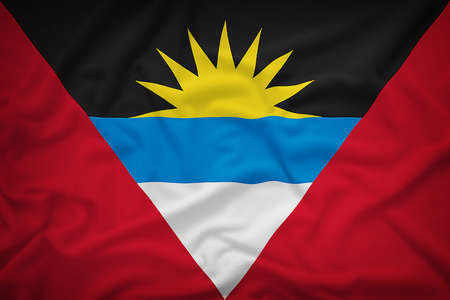 Antigua and Barbuda flag on the fabric texture background,Vintage styleの写真素材