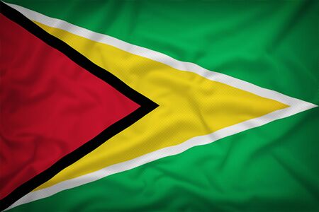 Guyana flag on the fabric texture background,Vintage styleの写真素材