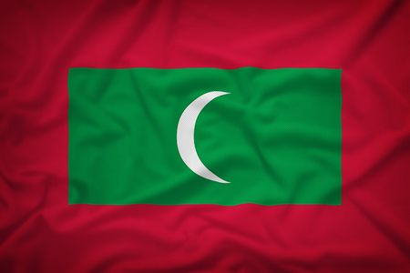 Maldives flag on the fabric texture background,Vintage styleの写真素材