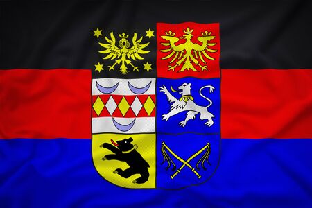 Ostfriesland mit Wappen flag on the fabric texture background,Vintage styleの写真素材