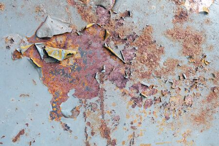 Old cracked paint pattern on rusty background