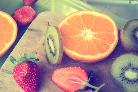 orange kiwi strawberry background