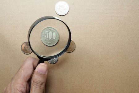 Magnifying Glass background concept Currency Analysis money,japan money Currency Analysis for business,tool for Analysis  Currency .の写真素材