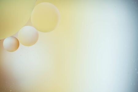 macro of oil mixed with water on colorful backgroundの写真素材