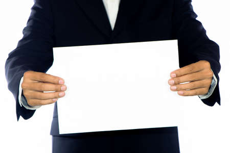 Young businessman holds blank signs.の写真素材