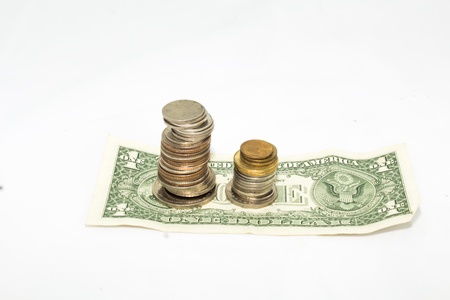 Monetary coin and cash on white background
