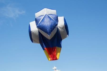 hot air balloon isolated on skyの写真素材