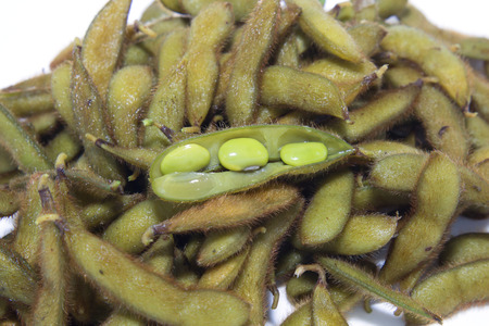 Green soybeans on white background 