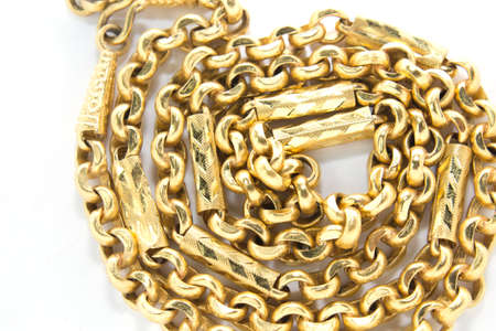 golden chains isolated over white 
