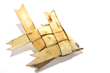 Fish-shaped ornaments ornaments hand made of palm leaf in Thailandの写真素材