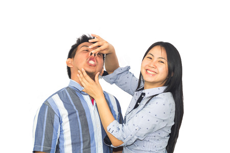 Young people of Thailand with a lovely smile isolate on whiteの写真素材