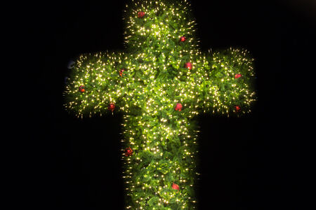 christian cross with bokeh light backgroundの写真素材
