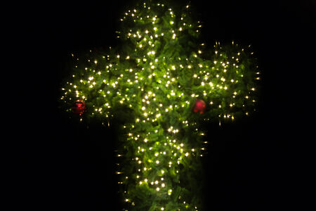 christian cross with bokeh light backgroundの写真素材