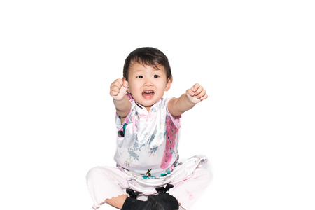 Asian children is happy New Year isolate on whiteの写真素材