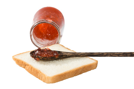 sweet strawberries jam on toast close upの写真素材
