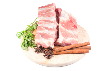 Raw Pork Ribs ,coriander, star anise, Cinnamon sticks on white backgroundの写真素材